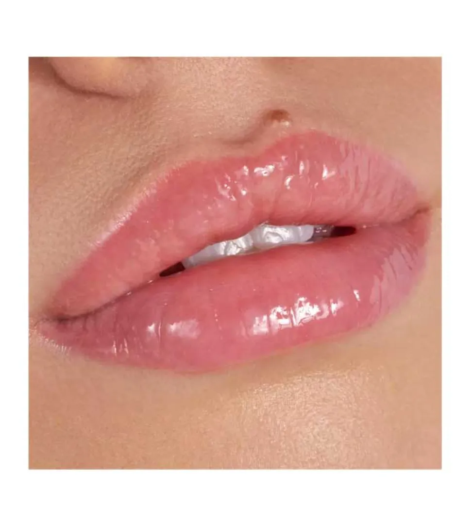 Brillo de labios voluminizador Plump It Up Lip Booster - 010: Poppin' Champagne