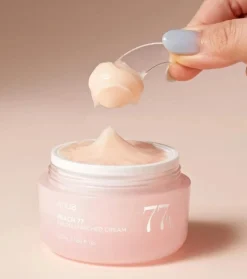 Crema enriquecida con extracto de melocotón 77% y niacinamida